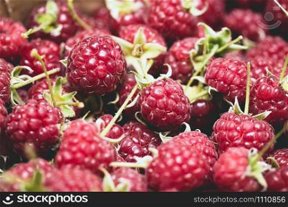 group of juicy raspberries close up shot