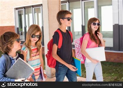 Group of little kids walking at School Campus