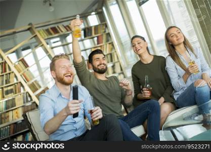 Group of male and female friends having fun at home