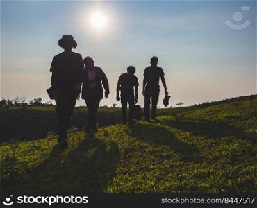 group of men backpackers are happy and joyful after successful hiking.