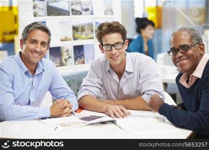 Group Of Men Meeting In Creative Office