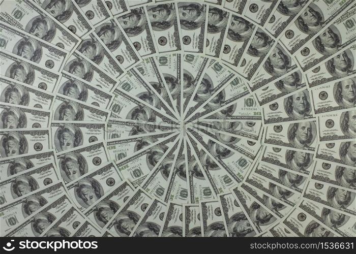 Group of money stack of 100 US dollars banknotes a lot of is arranged in a beautiful circle