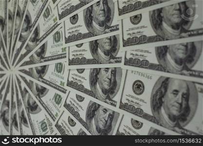 Group of money stack of 100 US dollars banknotes a lot of is arranged in a beautiful, Selective focus