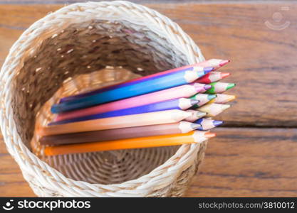 Group of multi colored pencils in craft box, stock photo