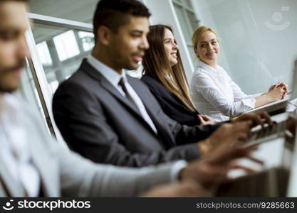 Group of  multiethnic business people sharing their ideas in the office