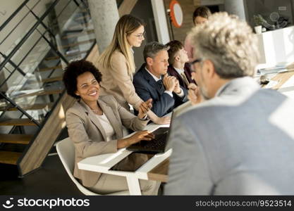 Group of multiethnic business people working on new project in the modern office