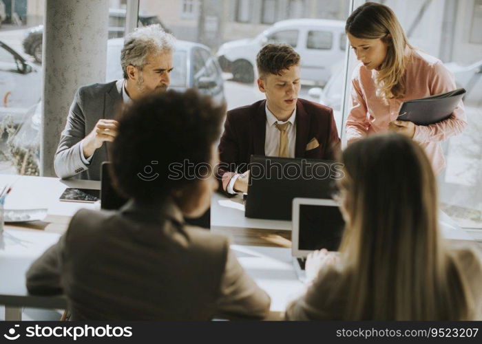 Group of multiethnic business people working together in the office