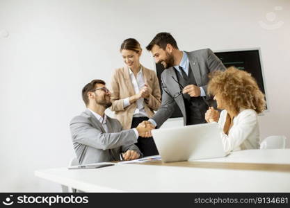 Group of multiethnic young business people working together in the office