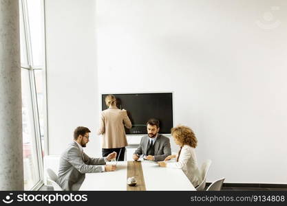 Group of multiethnic young business people working together in the office