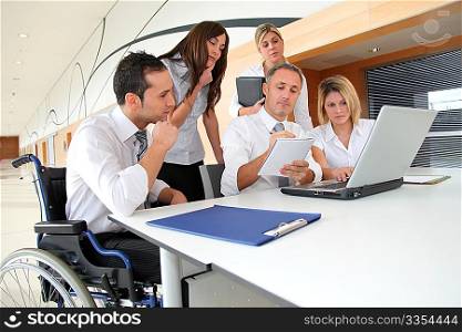 Group of office workers in a business meeting