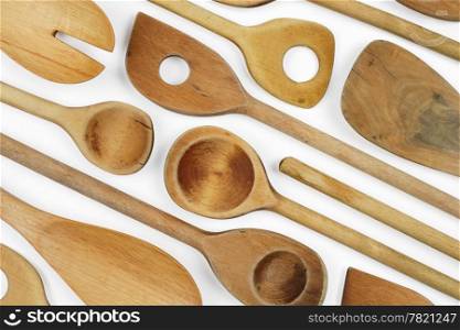 Group of old and new wooden spoons as a background.