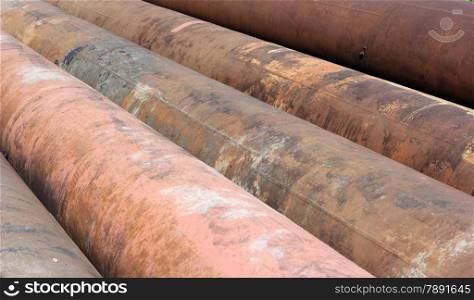 Group of old rusty metal pipes