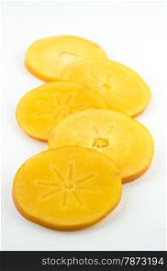 group of orange persimmon slices isolated on white background&#xA;&#xA;