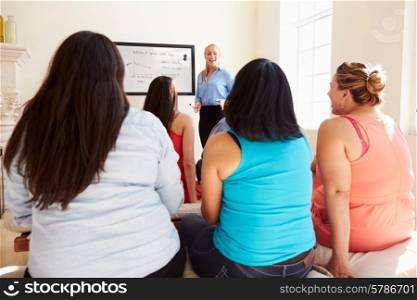 Group Of Overweight People Attending Diet Club