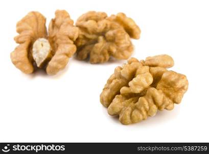 Group of peeled walnuts isolated on a white