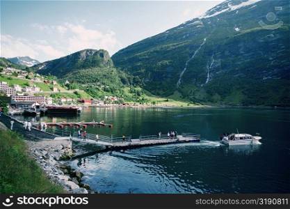 Group of people at a pier, Geiranger, Norway