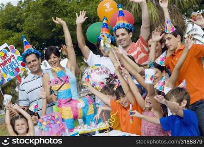 Group of people celebrating a birthday party