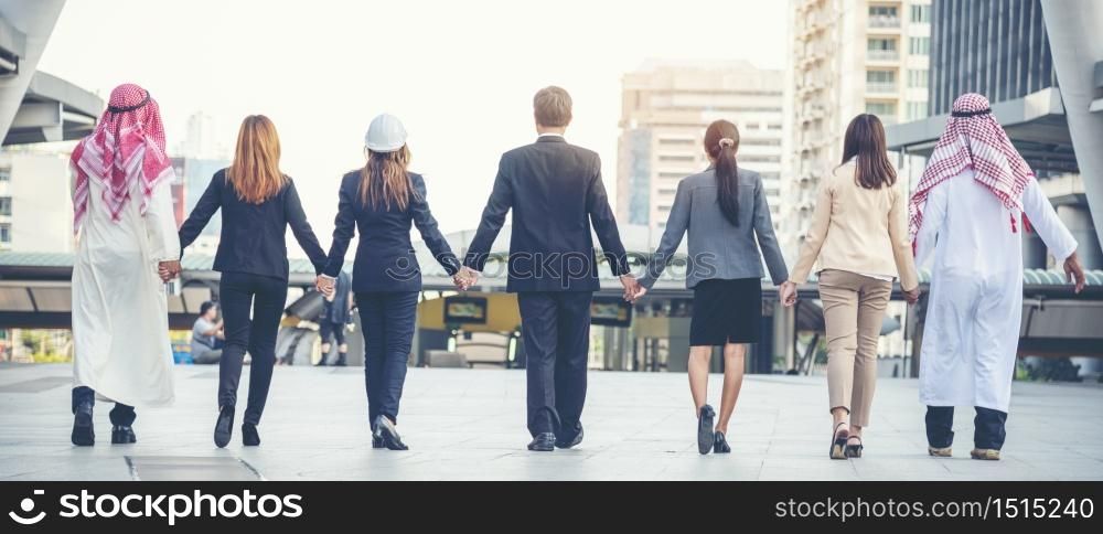 Group of people diversity multiethnic teamwork collaboration team meeting communication Unified team concept. Business people hands together diversity multiethnic diverse culture partner team meeting