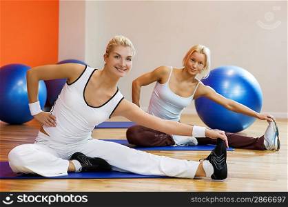 Group of people doing stretching exercise
