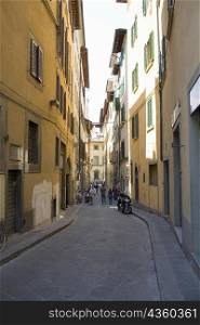 Group of people in an alley, Florence, Italy