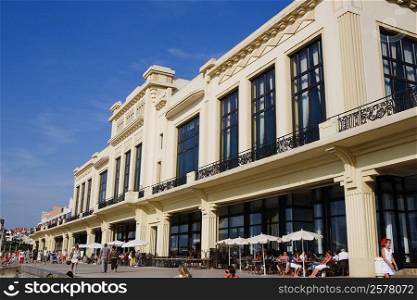 Group of people in front of a hotel, Casino Municipal, Grande Plage, Biarritz, France