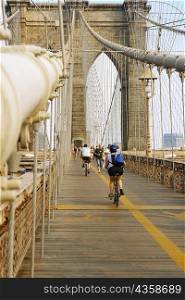 Group of people on a bridge, Brooklyn Bridge, New York City, New York State, USA