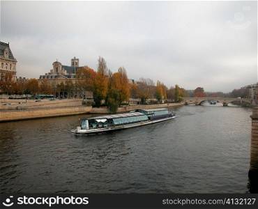 Group of people on a ferry in a river, Seine River, Paris, France