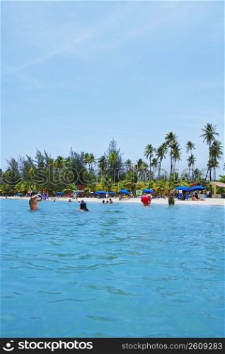 Group of people on the beach, Luquillo Beach, Puerto Rico