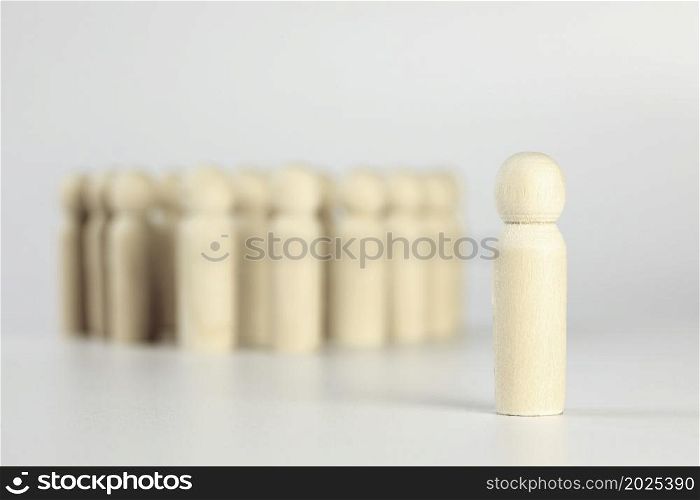 Group of people, one person standing out of the crowd, different or left out concept isolated on white background space for text. Group of people, one person standing out of the crowd, different or left out concept isolated on white background