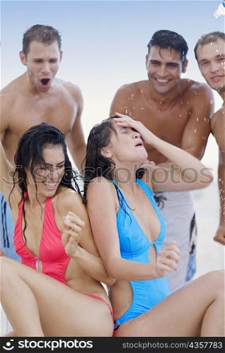 Group of people playing with water