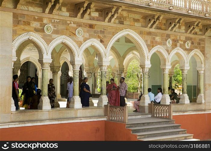 Group of people standing under an archway, Government Central Museum, Jaipur, Rajasthan, India