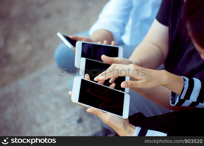 group of people using smart phone for online shopping,learning,working,business concept.