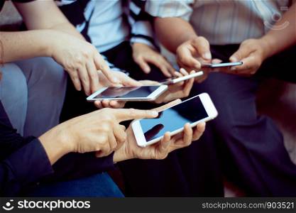 group of people using smart phone for online shopping,learning,working,business concept.