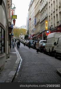 Group of people walking on the street, Paris, France