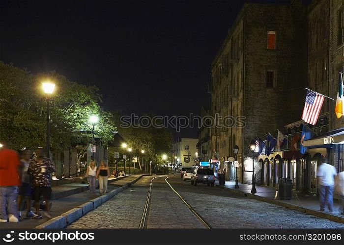Group of people walking on the walkway at night, Savannah, Georgia, USA