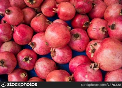 group of pomegranates. pomegranate closeup, background