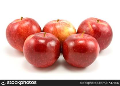 group of red apples on white background