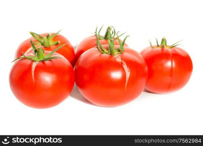 Group of red fresh tomatoes isolated on white background