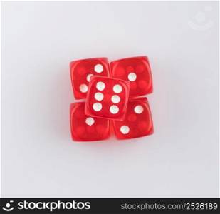 group of red playing dice on a white background, isolated. top view. playing dice, close-up
