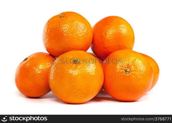 Group of ripe tangerines or mandarin with slice isolated on white background