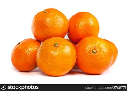 Group of ripe tangerines or mandarin with slice isolated on white background