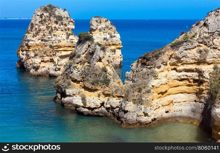 Group of rock formations along coastline (Ponta da Piedade, Lagos, Algarve, Portugal).