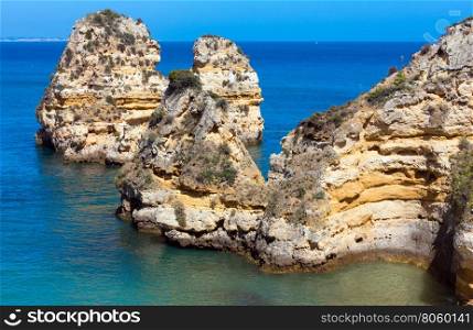 Group of rock formations along coastline (Ponta da Piedade, Lagos, Algarve, Portugal).