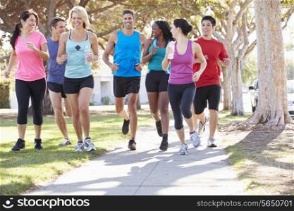 Group Of Runners On Suburban Street