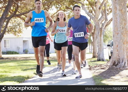 Group Of Runners On Suburban Street