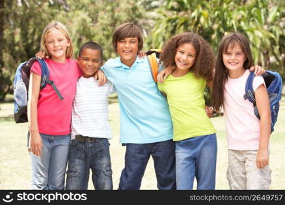 Group Of Schoolchildren Standing In Park