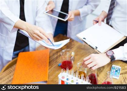 Group of scientists and pharmacists in the laboratory.