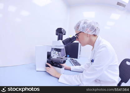 group of scientists working at the laboratory