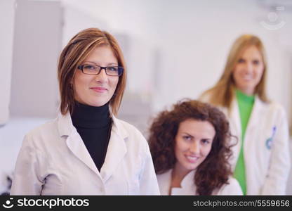 group of scientists working at the laboratory