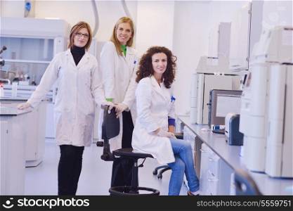 group of scientists working at the laboratory